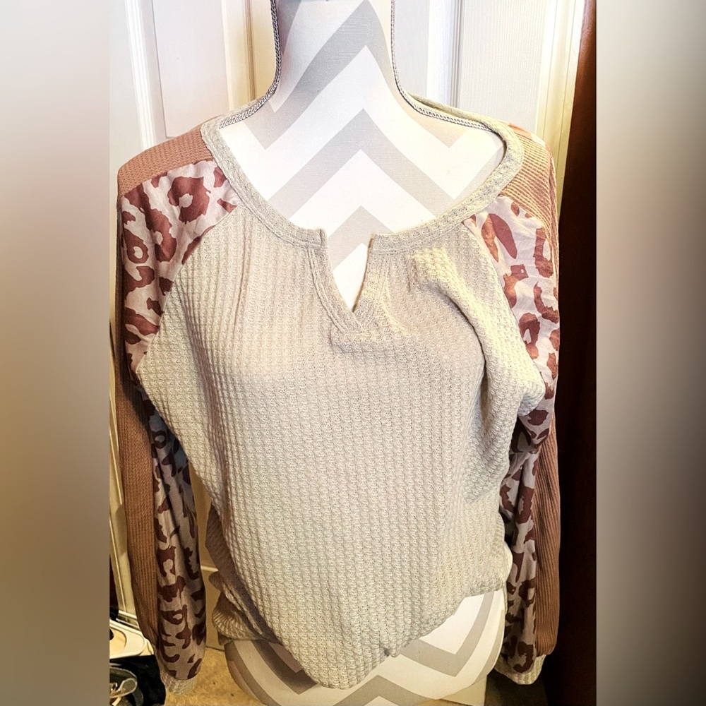 Long sleeve animal print top